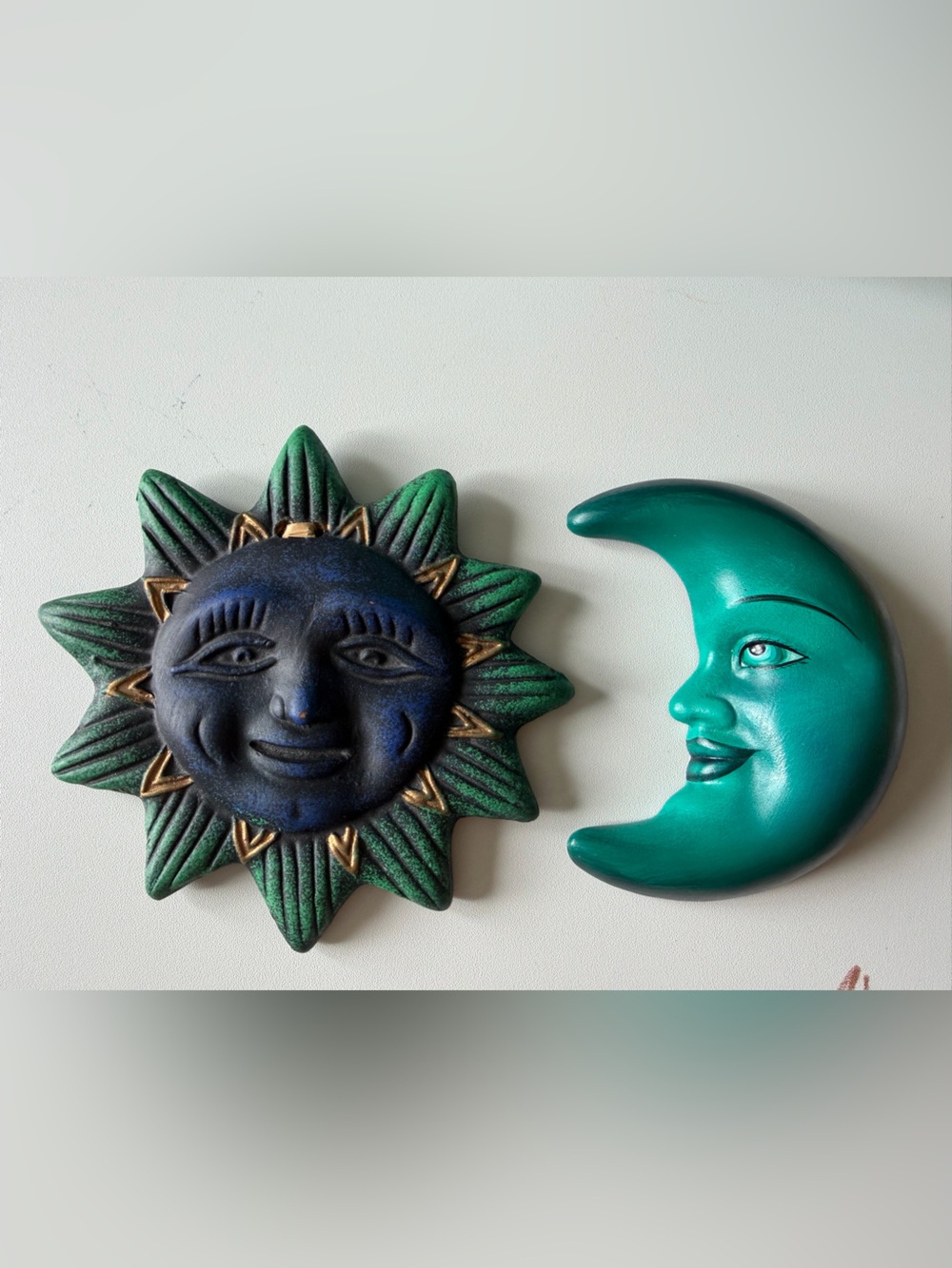 vintage celestial wall hanging set of a dark blue sun and teal crescent moon